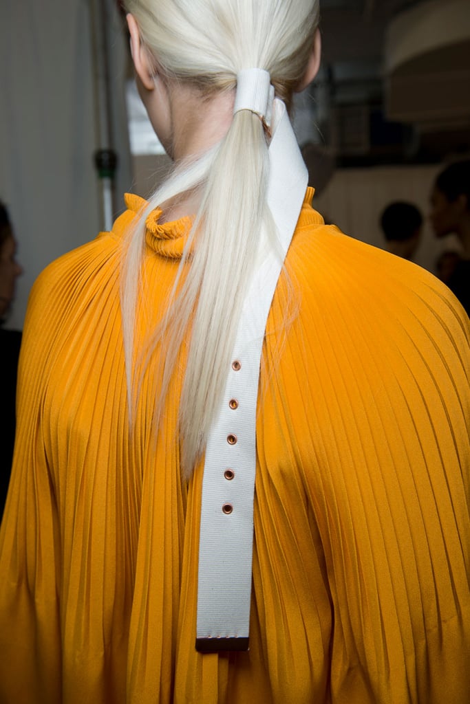 Using a belt as a hair accessory was probably the most unexpected beauty trend to emerge from NYFW, but truth be told, it can totally be pulled off. By looping the belt into itself and pulling it tightly around your hair, you can instantly create a stylish low ponytail. Or just preorder this one from the actual Tibi runway.