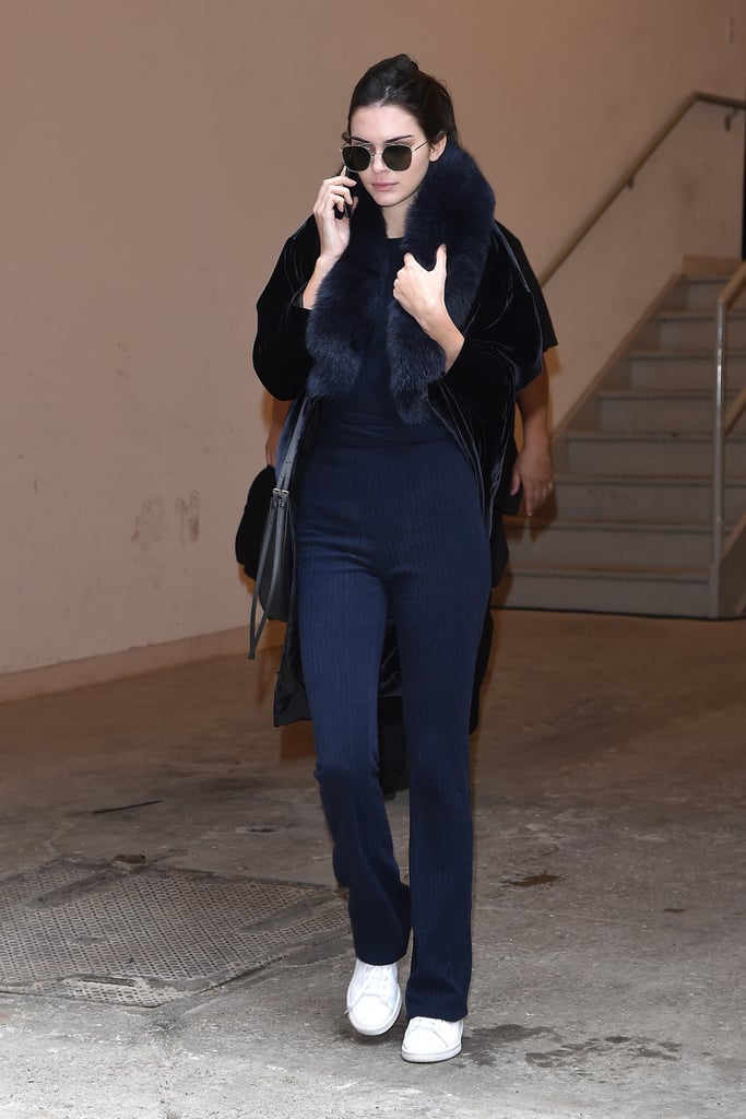 Afterward, She Bundled Up in a Navy Look and White Sneakers