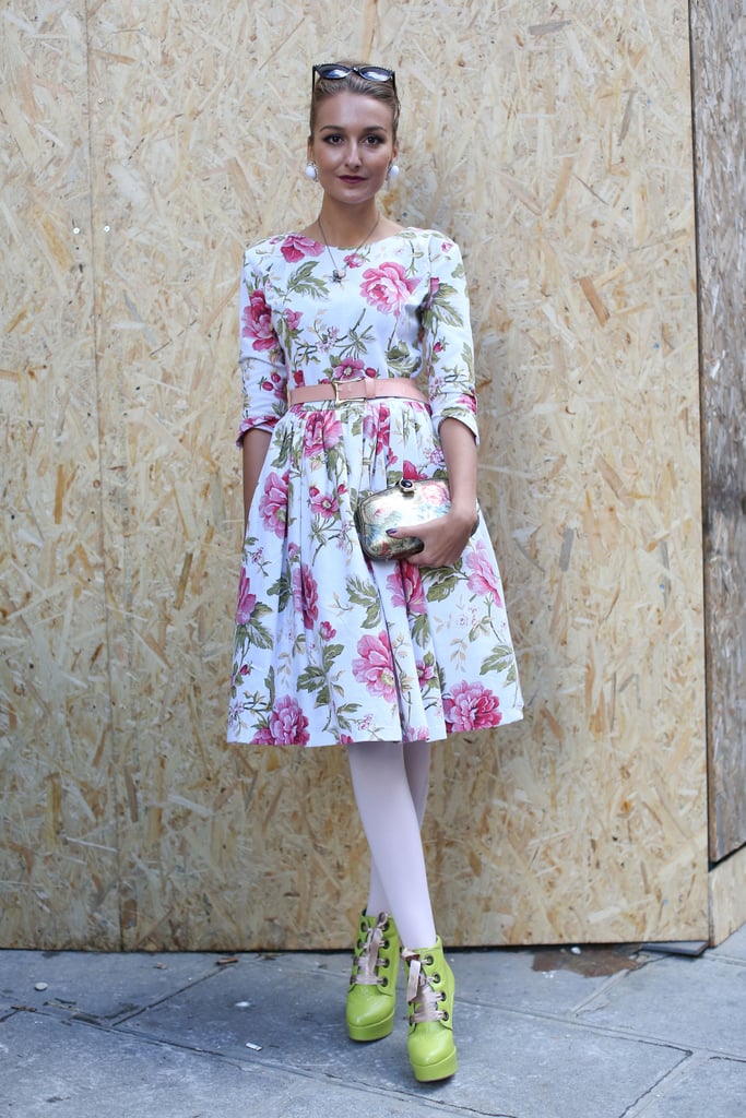 Her florals got a high-wattage update with lime-green lace-up booties.
Her florals got a high-wattage update with lime-green lace-up booties.