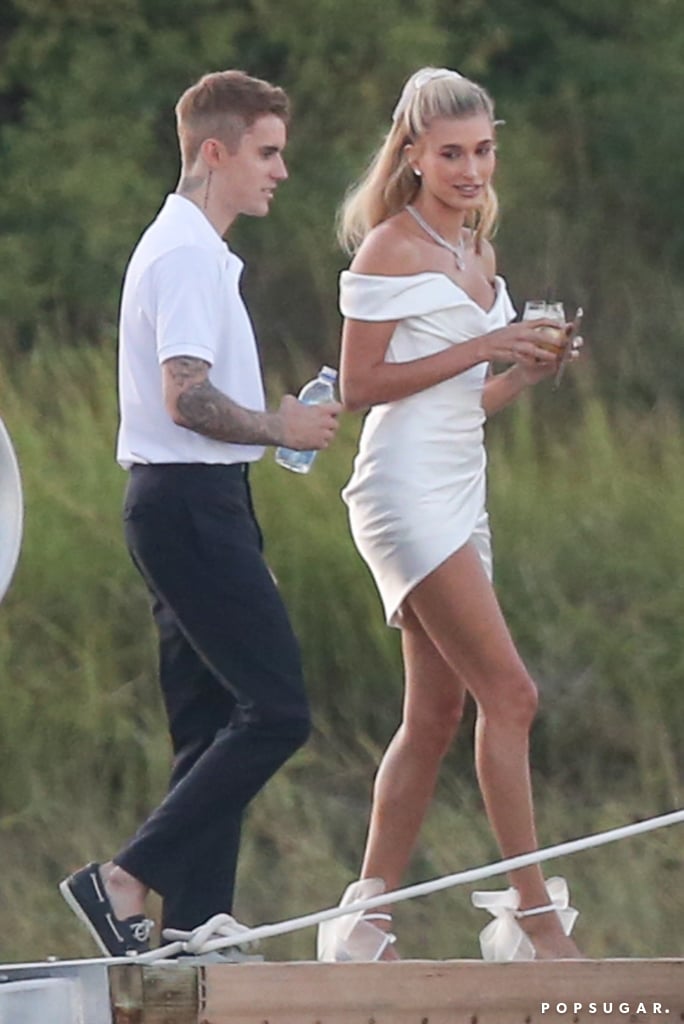 Justin Bieber and Hailey Baldwin are saying "I do" again, and this time they're doing it in style. A year after tying the knot in a courthouse wedding in New York City, the couple are having an official wedding reception in South Carolina on Sept. 30. One day before their nuptials, Justin and Hailey were spotted getting into a boat as they made their way to their rehearsal dinner at Montage Palmetto Bluff. Hailey looked bridal in a white cocktail dress, while Justin cleaned up nicely in a white polo and black slacks. The pair looked relaxed and carefree as they enjoyed a drink and posed for a few pictures together.
The big night brought out some of their closest friends and family. While Hailey's famous dad, Stephen Baldwin, and uncle Billy Baldwin were in attendance, guests also included Kendall Jenner, actor Kyle Massey, model Joan Smalls, Hillsong Church pastor Carl Lentz, and Justin's manager, Scooter Braun. Last week, Kendall also joined Hailey and her friends for a fun-filled bachelorette party, which Kendall helped plan.

    Related:

            
            
                                    
                            

            Justin and Hailey Bieber Don&apos;t Shy Away From Romance