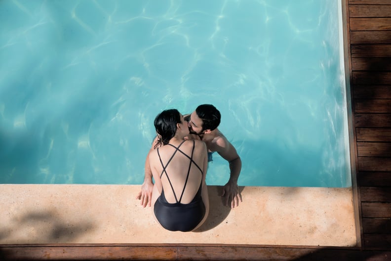 couple kissing on vacation in Mexico