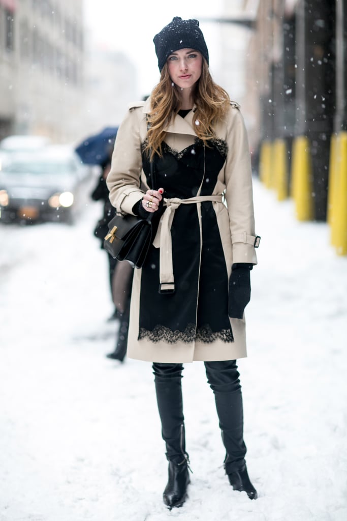 Snow doesn't mean you can't be sophisticated — take notes and add a water-resistant trench and sleek boots.