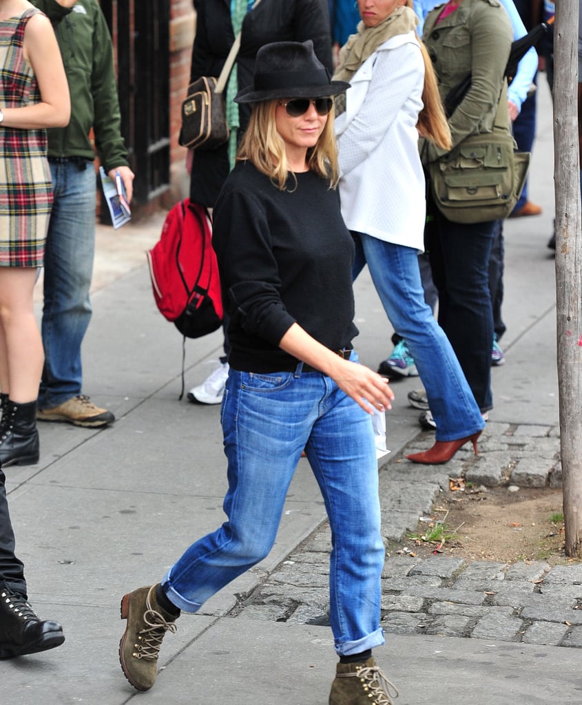 Her slouchy, rolled jeans looked cool with a sweater and a fedora in September 2011.