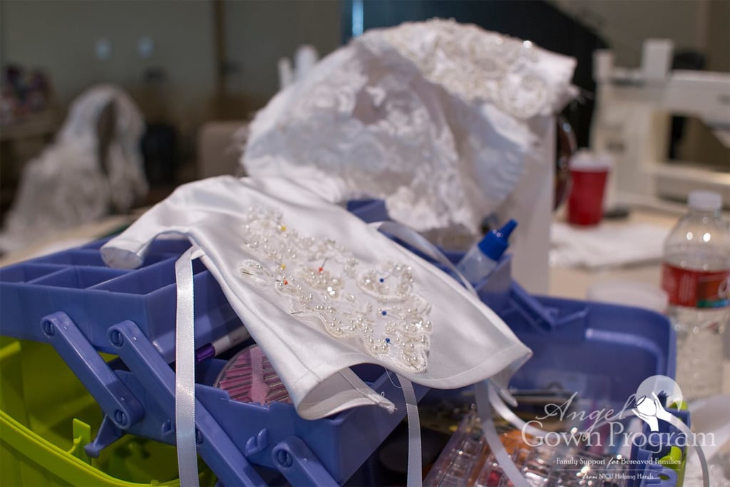 A Lacy Wedding Dress Being Transformed Into An Infant S Gown