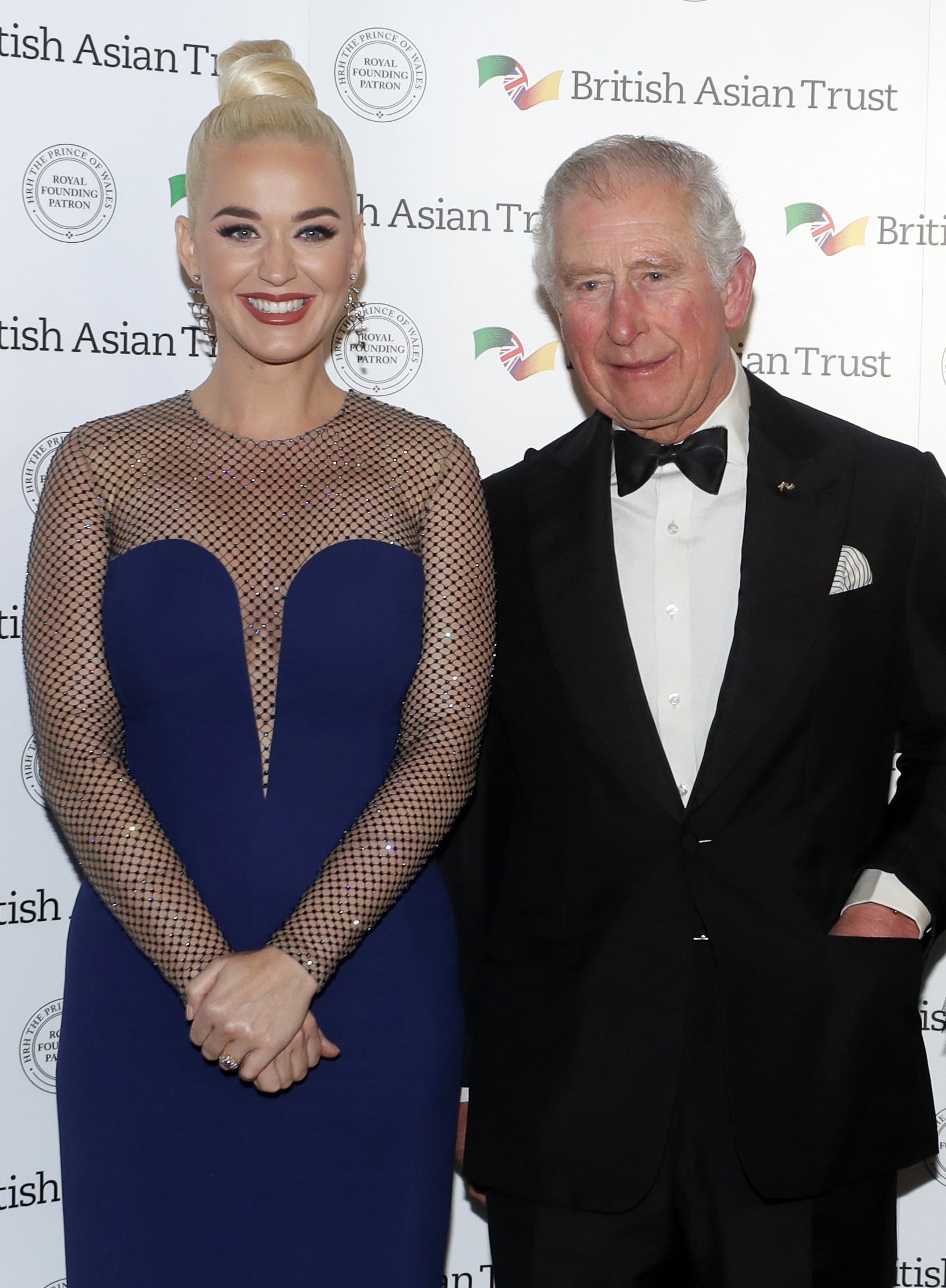 LONDON, UNITED KINGDOM - FEBRUARY 04: Prince Charles, Prince of Wales, Royal Founding Patron of the British Asian Trust poses with American musician Katy Perry as they arrive to attend a reception for supporters of the British Asian Trust on February 4, 2020 in London, England. (Photo by Kirsty Wigglesworth - WPA Pool/ Getty Images)