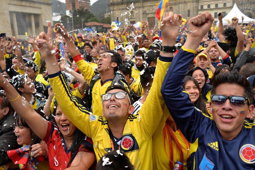 In Bogotá, Colombia, fans celebrated, jumping up and down.
