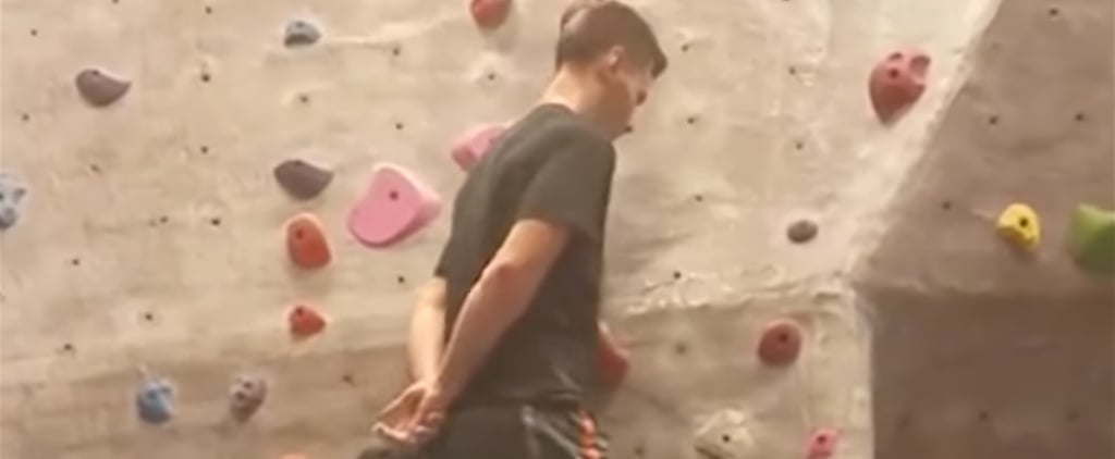 Man Rock-Climbing With No Hands
