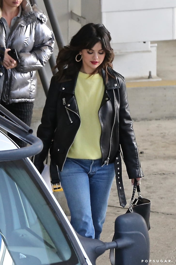 Selena Gomez Wearing Leather Jacket and Yellow Sweater