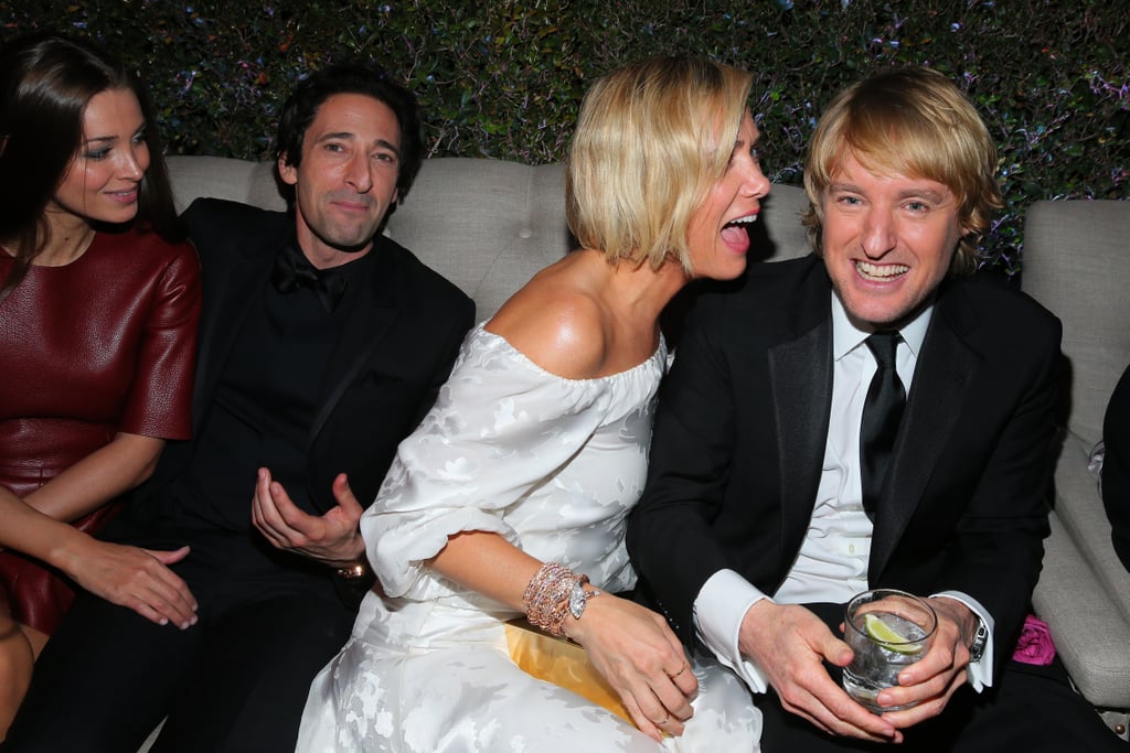 Kristen Wiig got up close and personal with Owen Wilson, while Adrien Brody and model Mara Lieto sat nearby at The Beverly Hilton.