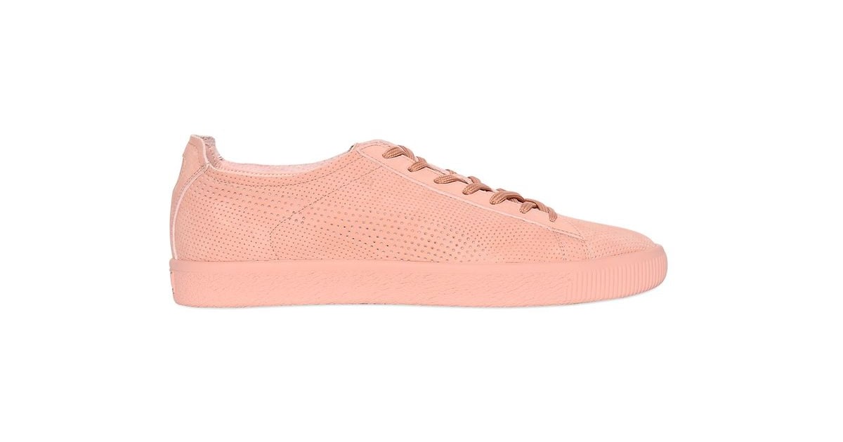 We can't get enough of the flamingo-pink shade of these Puma Select ...