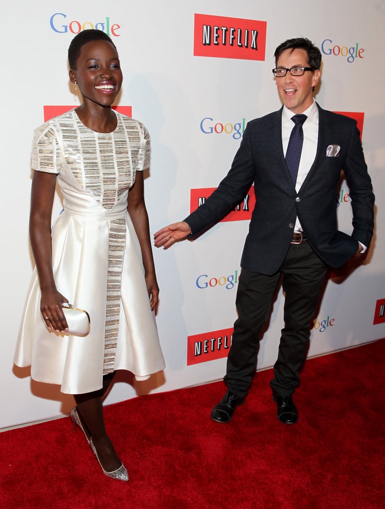 Lupita Nyong'o shared a red carpet moment with Scandal actor Dan Bucatinsky at Google and Netflix's bash on Friday.