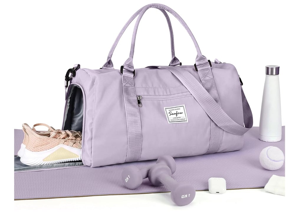 Wisepack Gym Bag Womens Mens with Shoes Compartment ($24, originally $27)
If you're looking for a gym bag that'll last, this one has you covered. It's made with water-resistant material and features a separate shoe compartment, a trolley sleeve for travel, and multiple pockets to keep you organized. The wide range of colorways is a fun bonus.
Pros: Water-resistant and has a durable build
Cons: Shoulder strap lacks padding, so avoid overpacking
Material: Water-resistant fabric
Dimensions: 17.7" x 7.5" x 11.8"
Colorways: 44
Who It's Best For: Anyone who needs a reliable gym bag that doubles as a stylish weekender or carry-on
Extras: Trolley sleeve for easy travel, multiple external and internal compartments for smart organization
What Reviewers Say: "One side of the bag works as a shoe storage, and the other for your water bottle or phone. I've had this for months now and have tossed this in and out of my car and around hotels and gyms. Very durable. There have been no problems with the zippers or the material ripping with time."