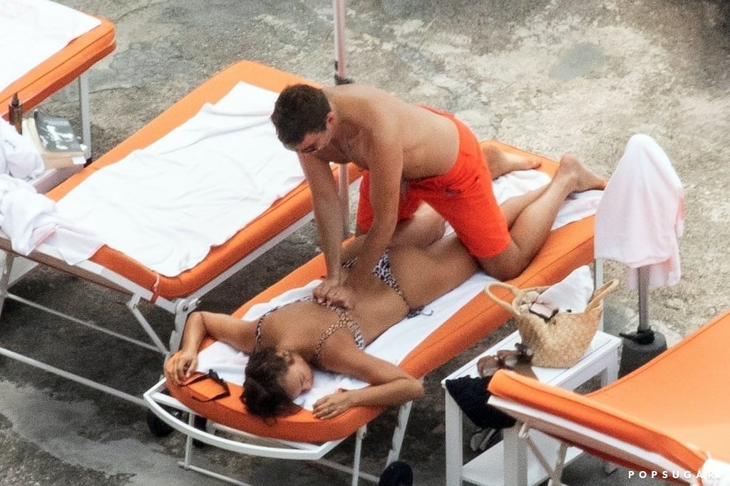 Bradley Cooper gave Irina Shayk a back massage during a PDA-filled beach day in Italy in August 2018