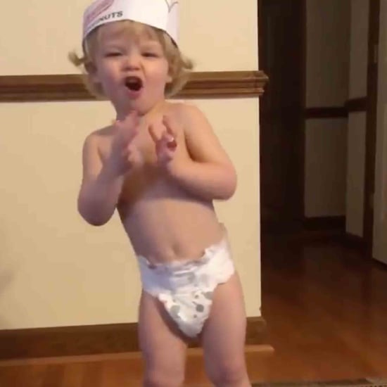 Little Boy Dancing in a Krispy Kreme Hat