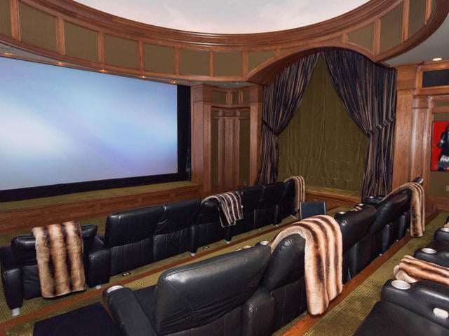 There's no need to go to the movies when there's a private 20-seat theater right in the home. There's no need to go to the movies when there's a private 20-seat theater right in the home.