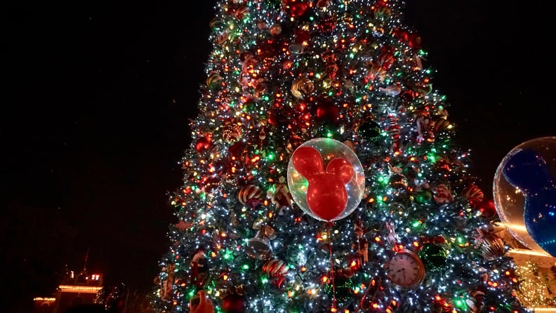 Snow falls on Main Street as a grand finale to the Believe . . . in Holiday Magic fireworks show.