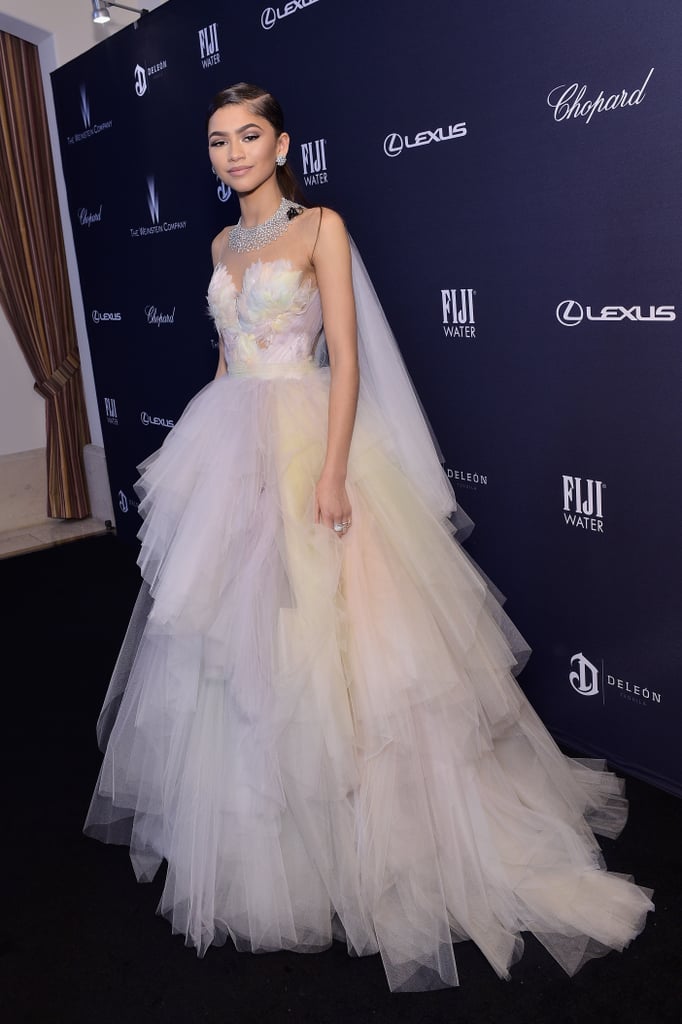 The star later changed into a poufy tiered Marchesa ballgown, which she finished with a Pasquale Bruni diamond necklace and earrings.