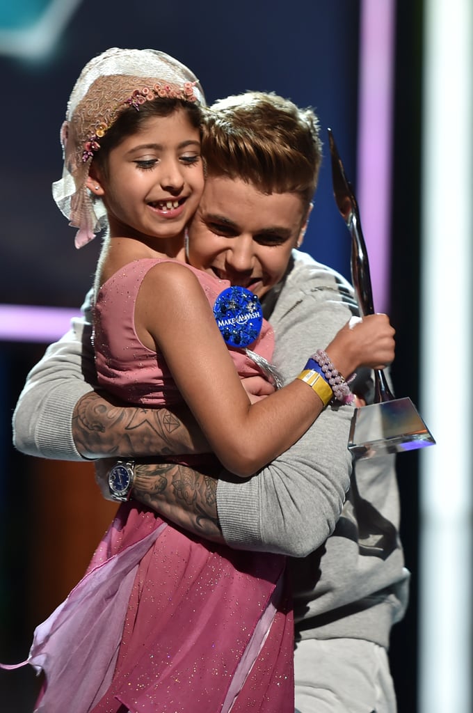 Justin Bieber hugged Make a Wish recipient Grace Kesablak at the Young Hollywood Awards on Sunday in LA.