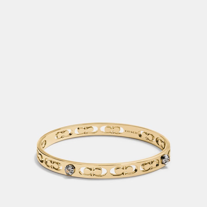 Coach Daisy Rivet Pierced Kissing C Bangle