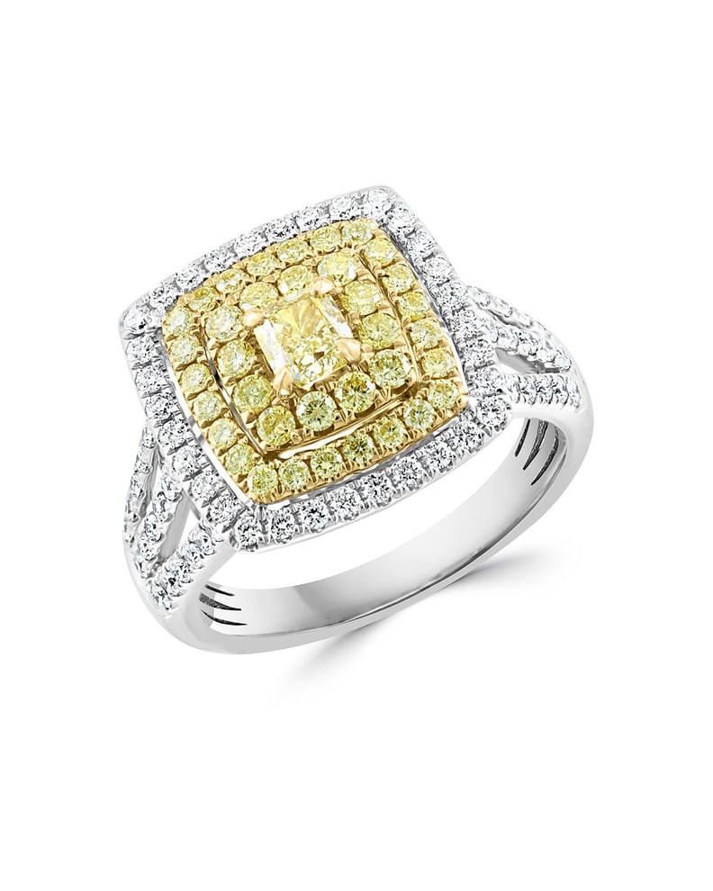 布鲁明岱尔黄色和白色钻石缓冲和一轮削减声明戒指