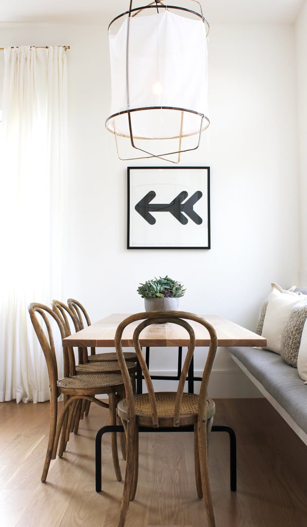 Merida would definitely choose a table large enough for family dinners, then she'd top it off with arrow accent pieces.
