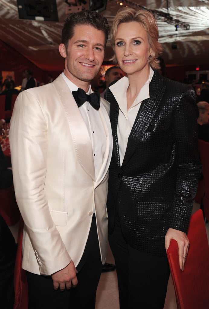 Jane Lynch and Matthew Morrison chatted it up at Elton John's Oscar party.
Jane Lynch and Matthew Morrison chatted it up at Elton John's Oscar party.