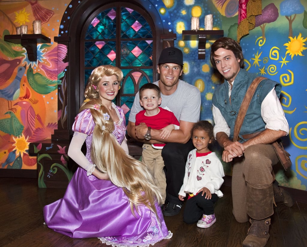 Tom Brady and his son Jack posed with Disney characters at the California park in April 2011.