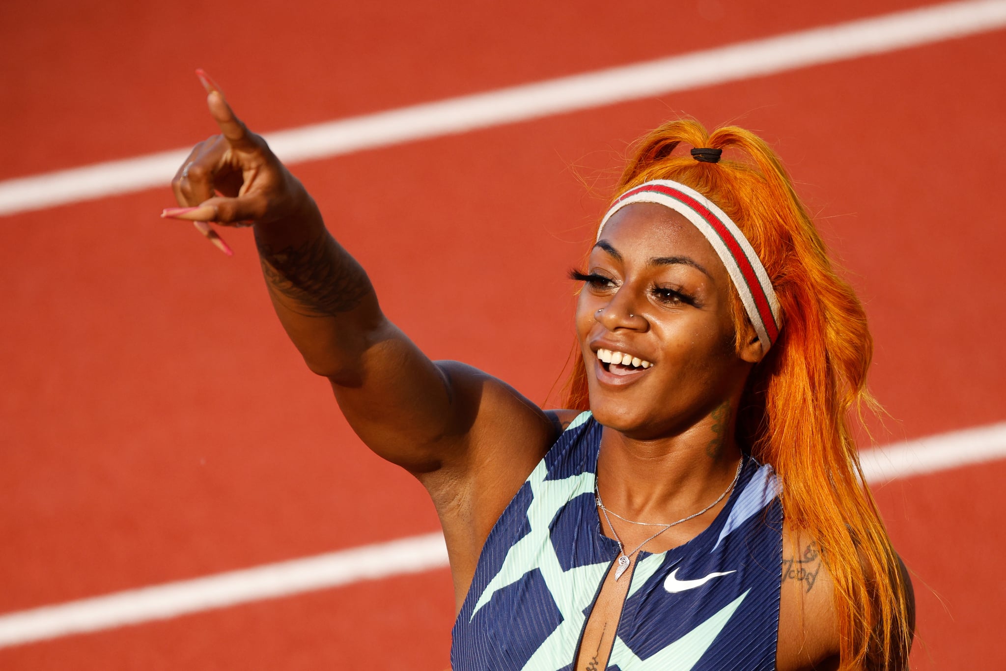 EUGENE ، اورگان - 19 ژوئن: Sha'Carri Richardson پس از رقابت در مرحله نیمه نهایی 100 متر زنان در روز 2 مسابقه های تیم دو و میدانی المپیک 2020 ایالات متحده در Hayward Field در 19 ژوئن 2021 در اوژن ، اورگان واکنش نشان داد.  (عکس از کلیف هاوکینز / گتی ایماژ)