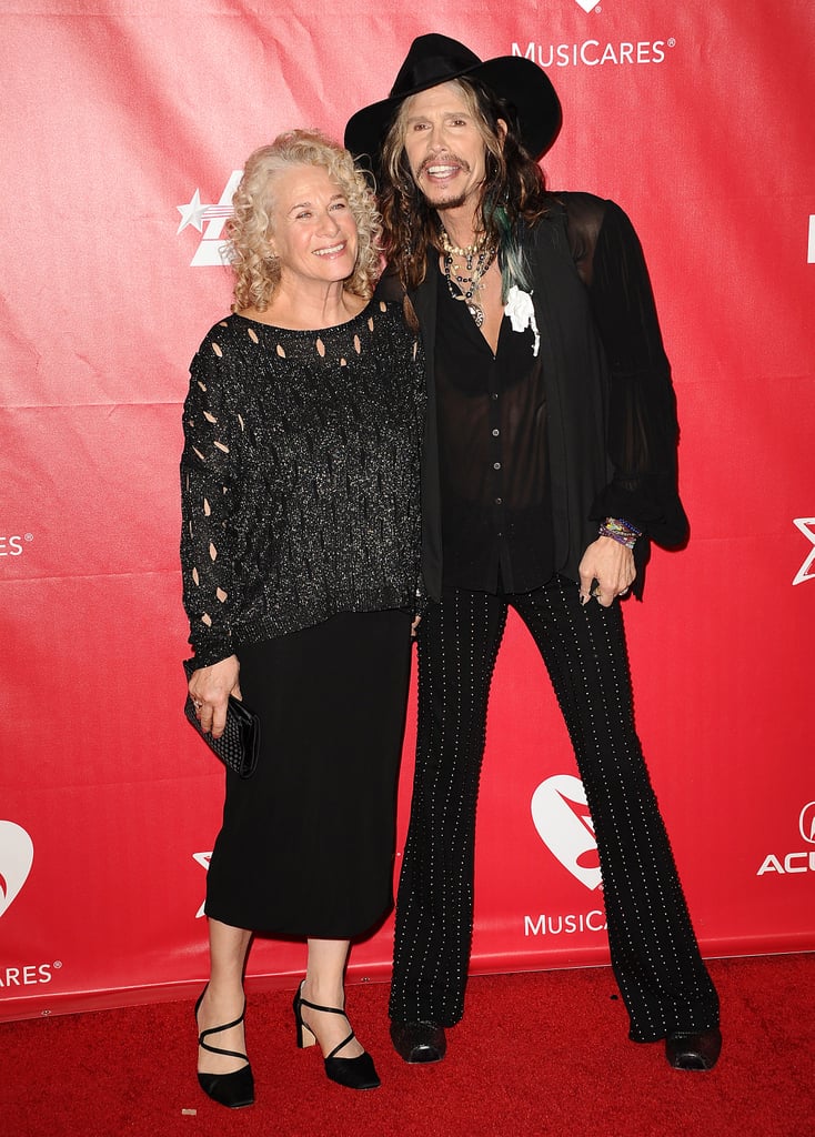 The night's honoree, Carole King, linked up with Steven Tyler on the red carpet at the 2014 MusiCares Person of the Year event.