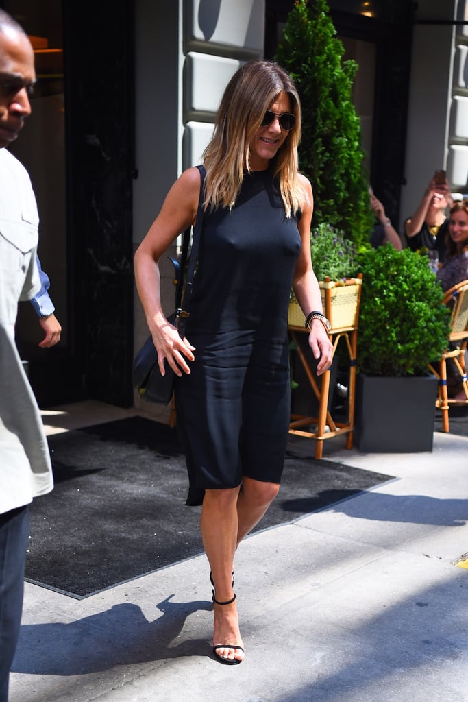 It wasn't long after that Jen ditched a bra to slip into this swingy black shift. Sure, you could make out the shape of her breasts, but we chose to focus on the styling tricks that could be gleaned from her look.