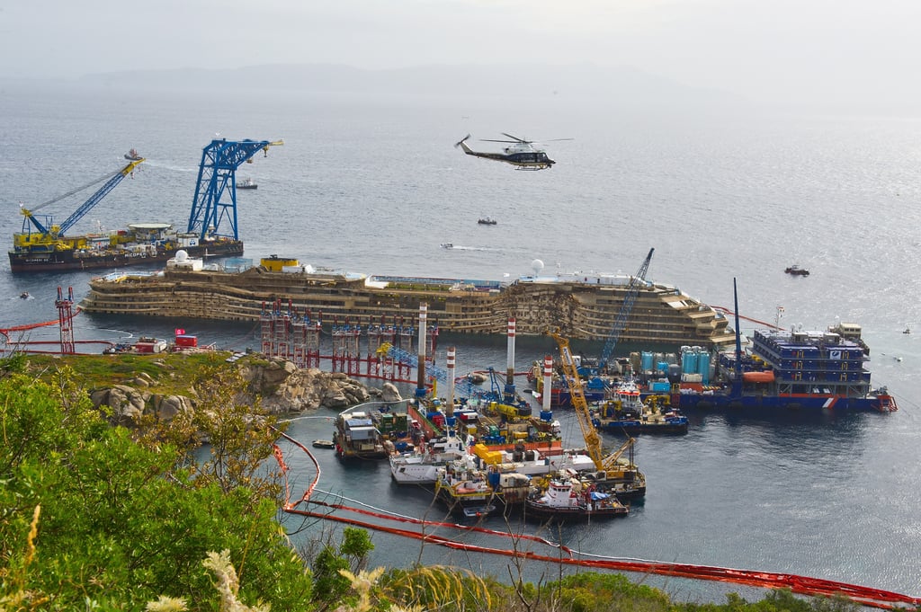 The upright ship was prepared to be towed away and scrapped.