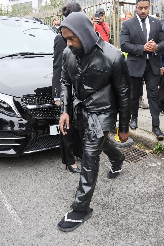 Kanye West Wears Socks and Flip-Flops at Burberry Show