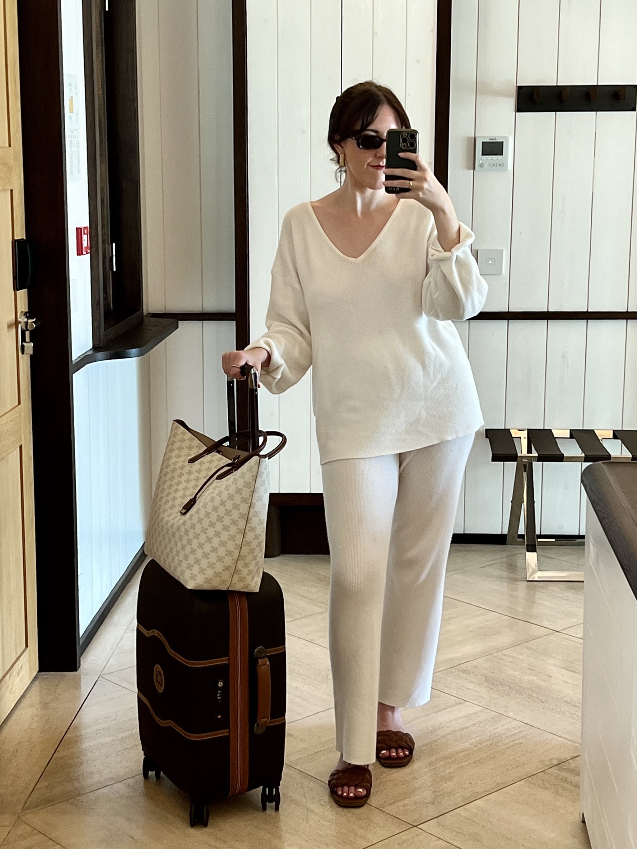 woman wearing VamJump 2-Piece Lounge Set from Amazon while taking a selfie in a hotel mirror