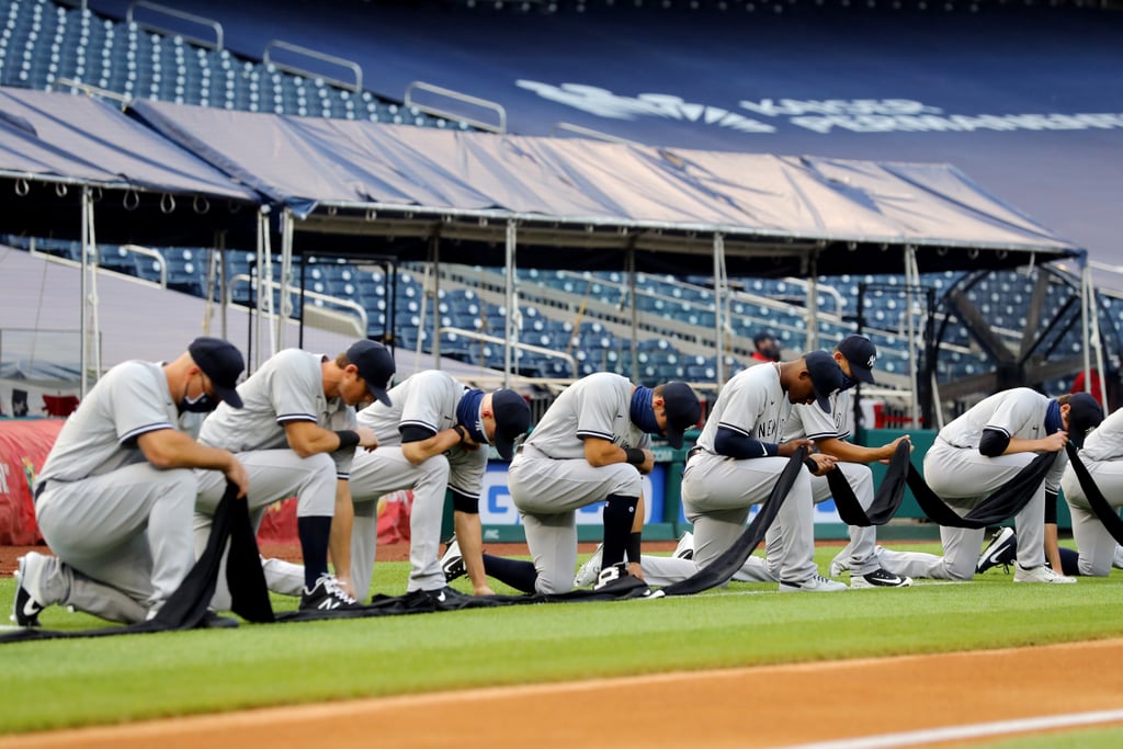 See MLB Players Kneel For Racial Justice on Opening Day