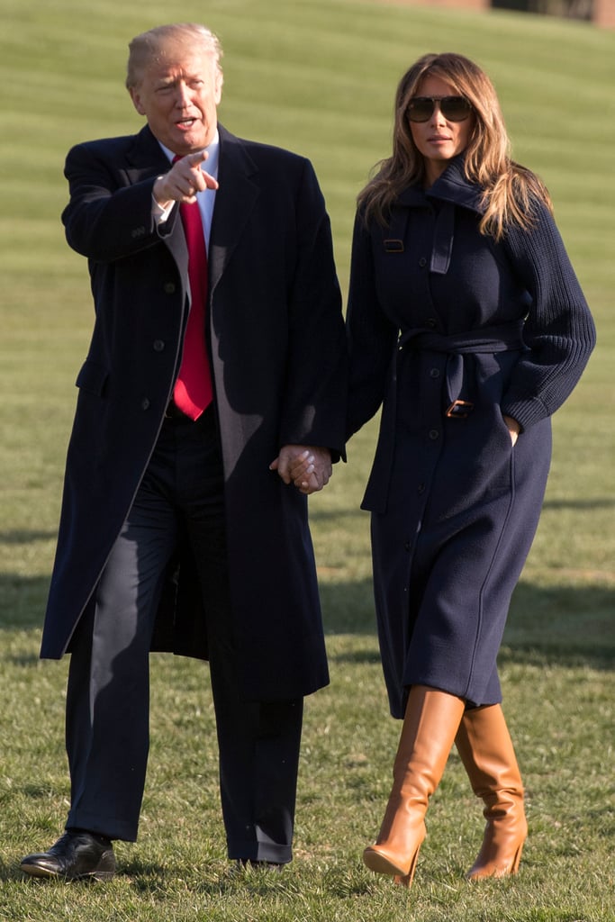 On March 19, Melania walked across the South Lawn with Donald Trump after returning from a trip. She bundled up in a thick navy coat from Chloé and wore a pair of eye-catching cognac-colored boots.