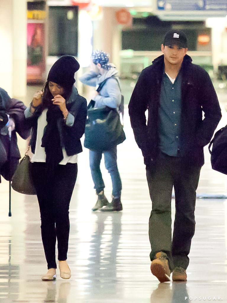 Ashton Kutcher and Mila Kunis Land at LAX | Pictures