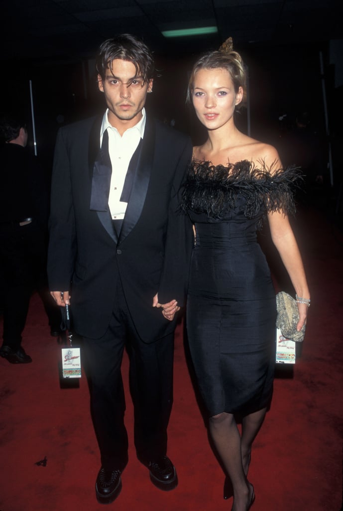 Kate wears a black knee-length dress with an ostrich feather trim to Frank Sinatra's 80th birthday in 1995.