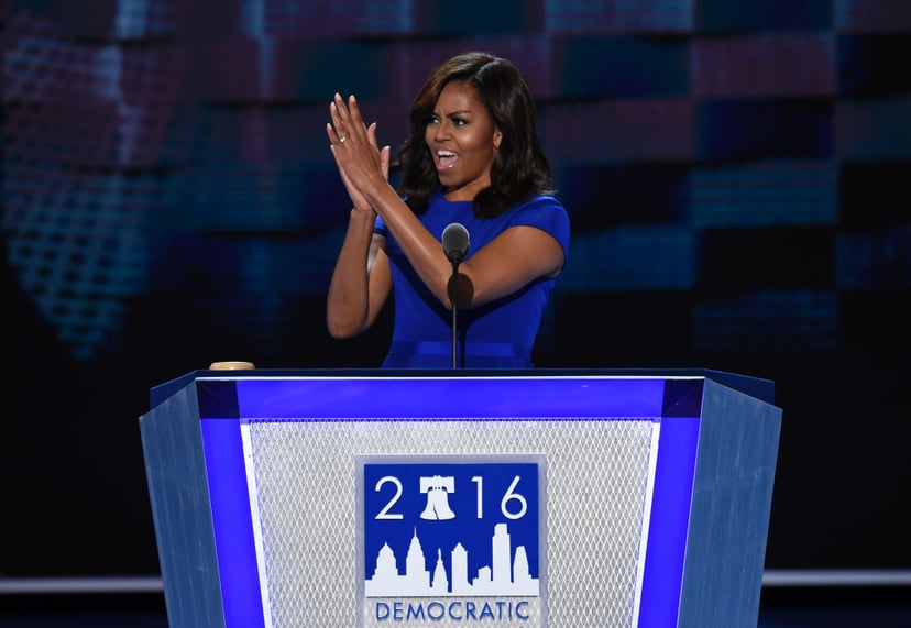 US First Lady Michelle Obama gestures during Day 1 of the Democratic National Convention at the Wells Fargo Center in Philadelphia, Pennsylvania, July 25, 2016. / AFP / SAUL LOEB        (Photo credit should read SAUL LOEB/AFP/Getty Images)