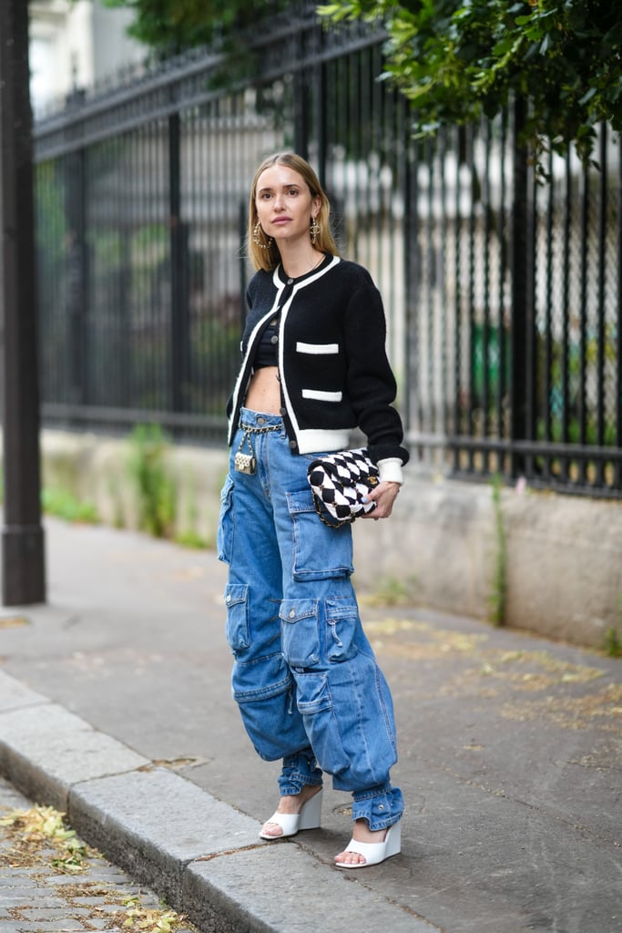 Remix the sporty vibes of cargo jeans with heels and a sophisticated cardigan.