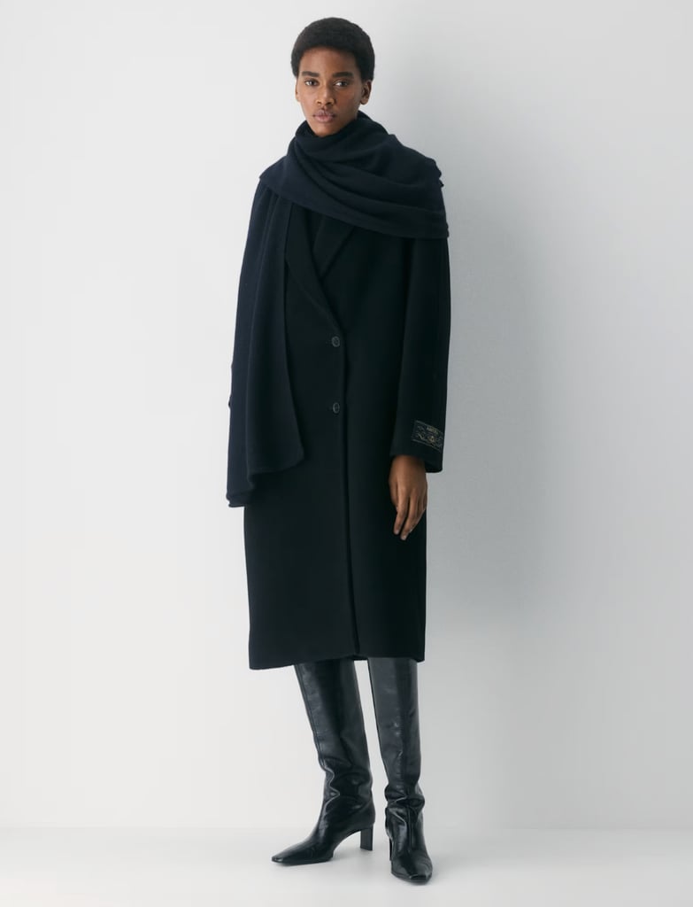 Aritzia The Slouch Coat ($280, originally $350)
With celebrities like Sabrina Carpenter rocking this coat around NYC, it's no secret — it's sought after. Honestly, Aritzia doesn't need to mark it down at all, but wow, are we grateful. You can score up to 50 percent off the site for the brand's Black "Fiveday" sale. Plus, the Super Puff — Aritzia's most popular coat — is 10 percent off, which basically never happens.