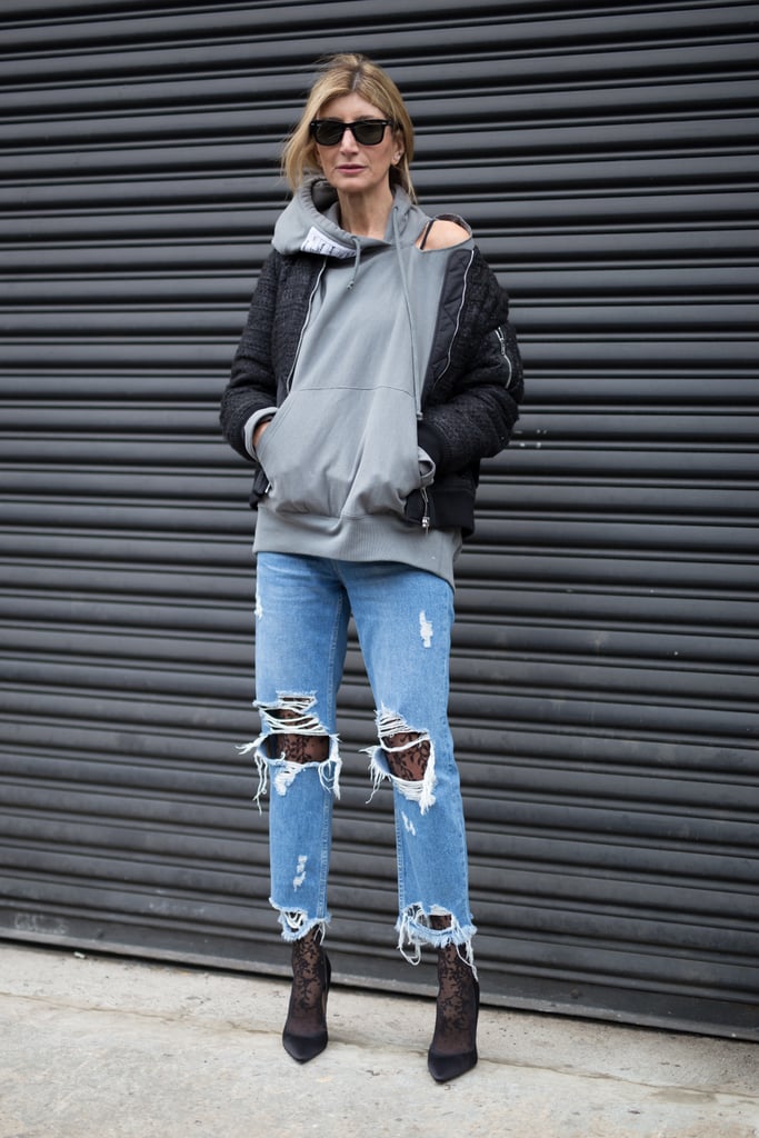 With a hoodie, bomber, and booties that look infinitely cooler with ripped jeans