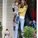 Miranda celebrated the holidays with baby Flynn in a pair of light-wash Frame Denim jeans, which she styled with a bright yellow Boy. by Band of Outsiders sweater and a boho-chic Rag & Bone hat.