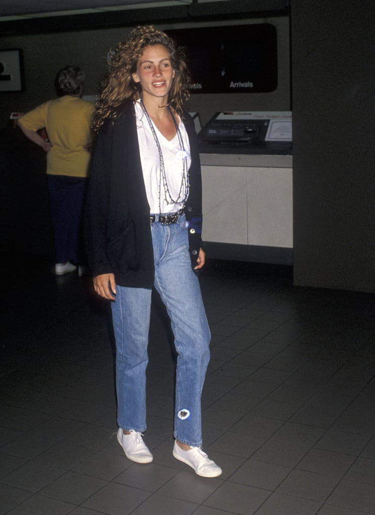 Julia is the queen of uncomplicated, cool airport style here in 1990.