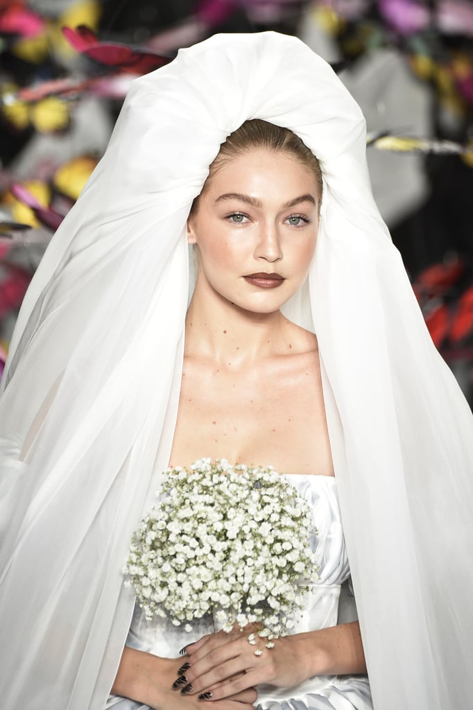 Gigi Hadid as a Bride in Moschino's Spring / Summer 2019 Show