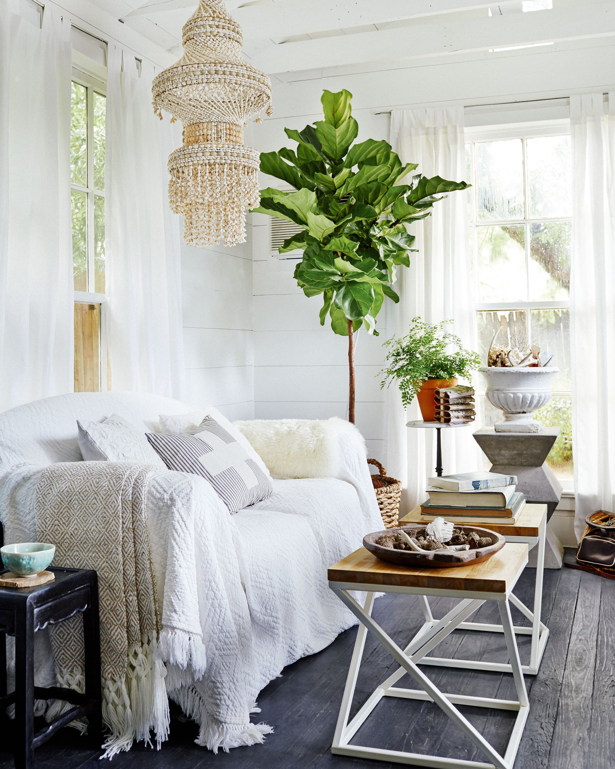 Throwing A Large White Bedspread Over The Sofa Lends A Bohemian