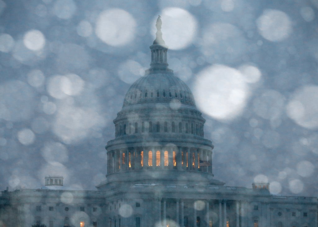 The US Capitol building was hit with heavy snowfall.