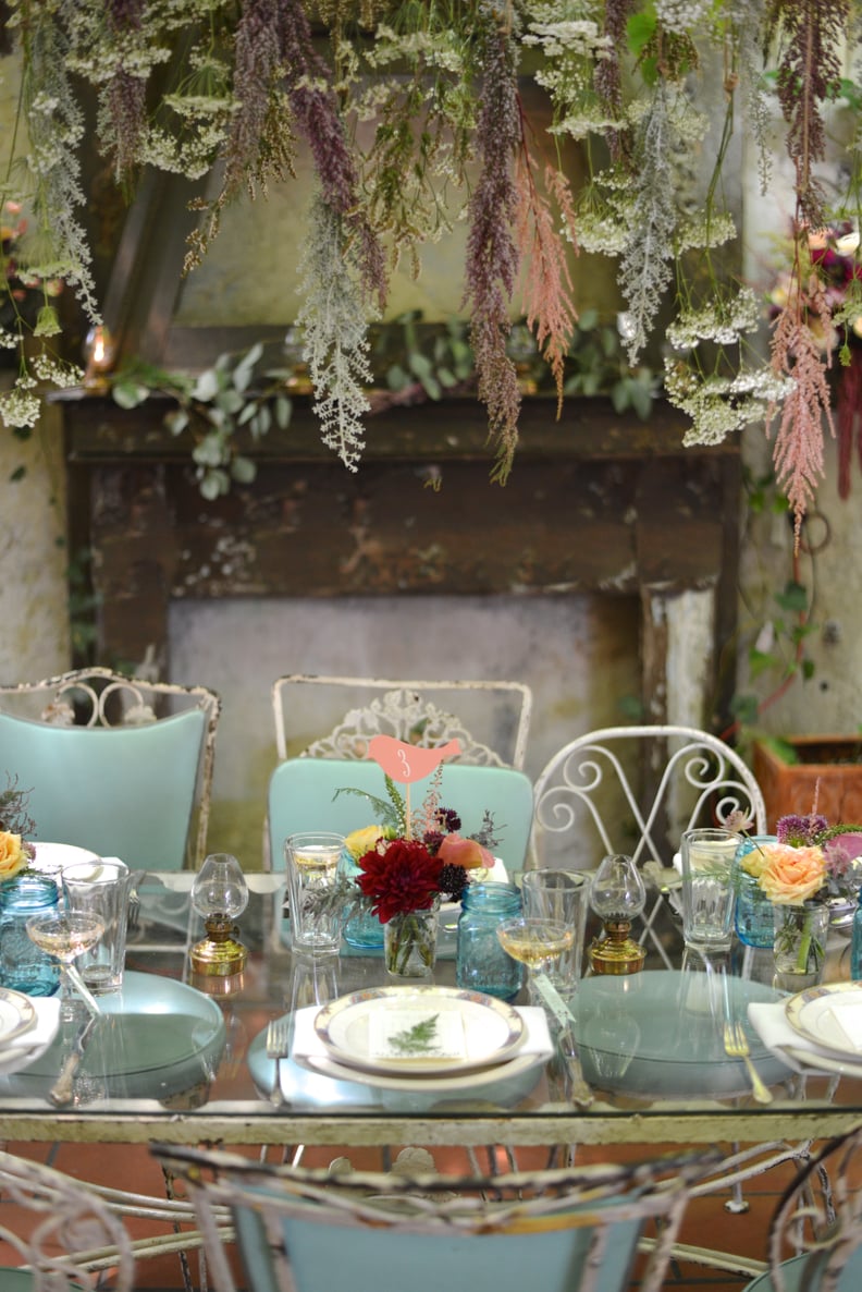 Hang foliage above the table like this . . .