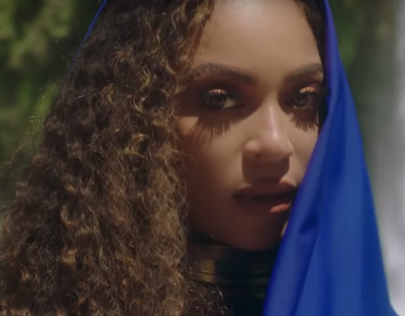 Beyoncé's Gold Makeup and Matte Lipstick in "Spirit" Music Video