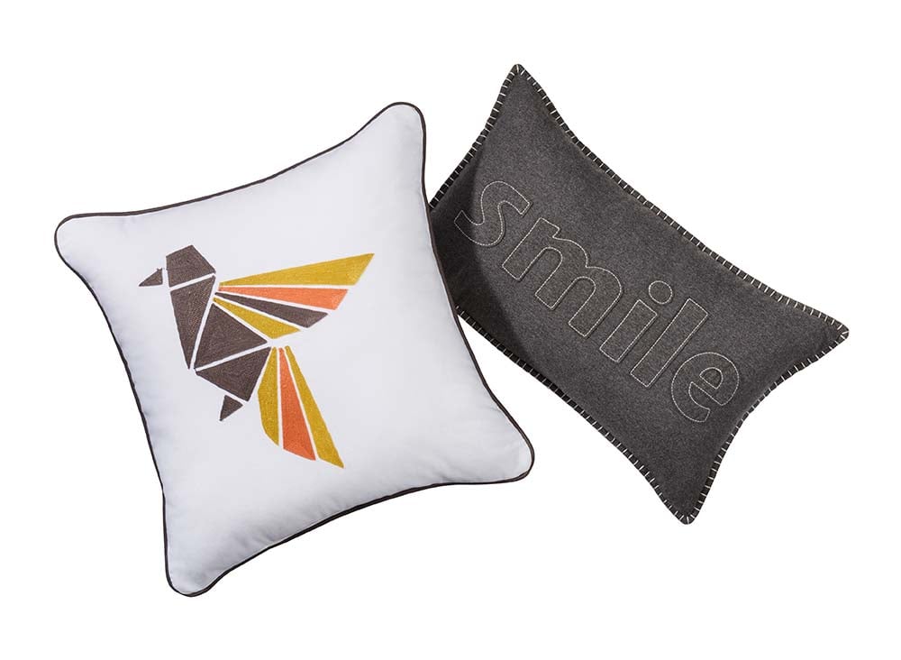 Room Essentials "Smile" Oblong Pillow ($17). Room Essentials Origami Bird Throw Pillow ($20).