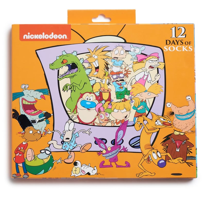 The Front of the Box Features Your Favorite Cartoon Characters Bursting Out of a TV